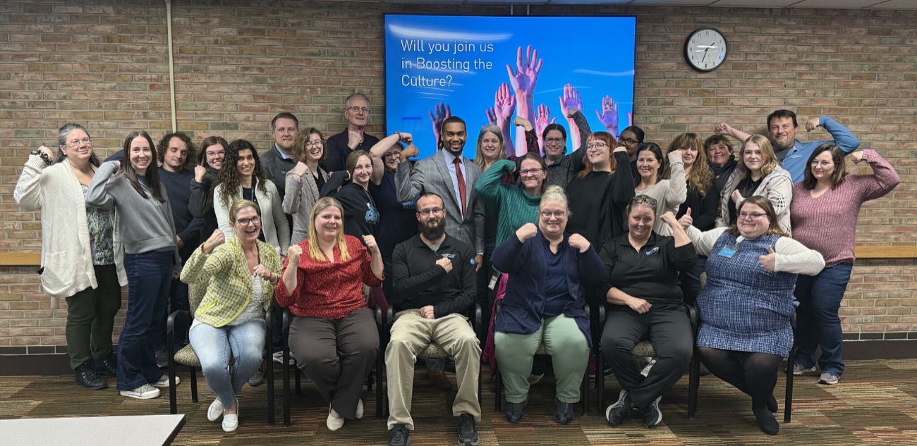 Mo Brooks with a team after a Boosting the Culture workshop